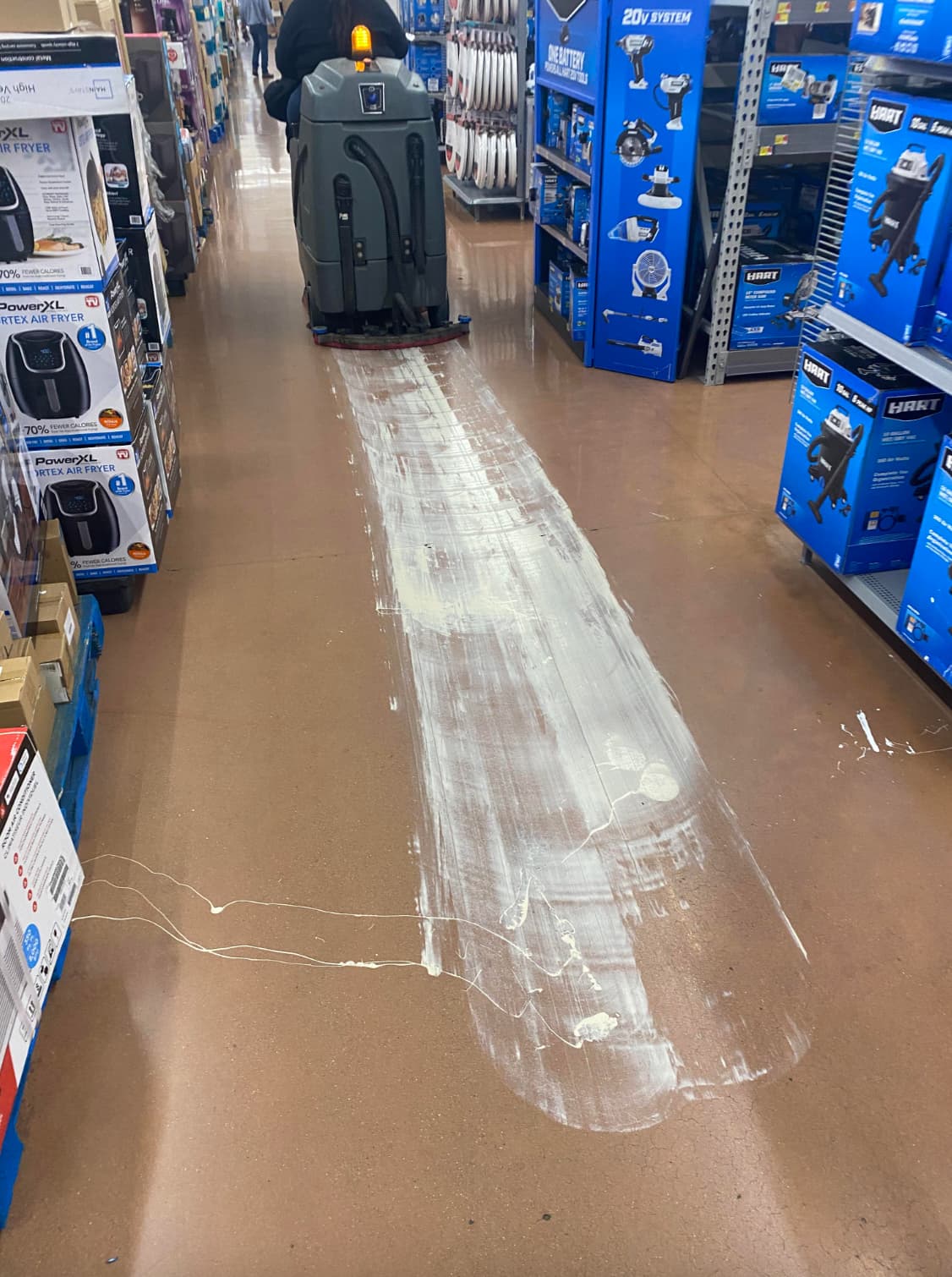 “Manager tried to clean up a paint spill with floor scrubber…”